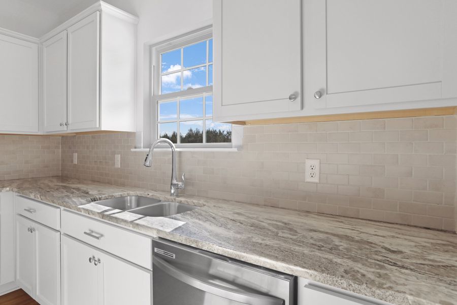 Image 48 representing the The Brunsen by RTS Homes in The Village at Sassafras, Allenhurst, GA.