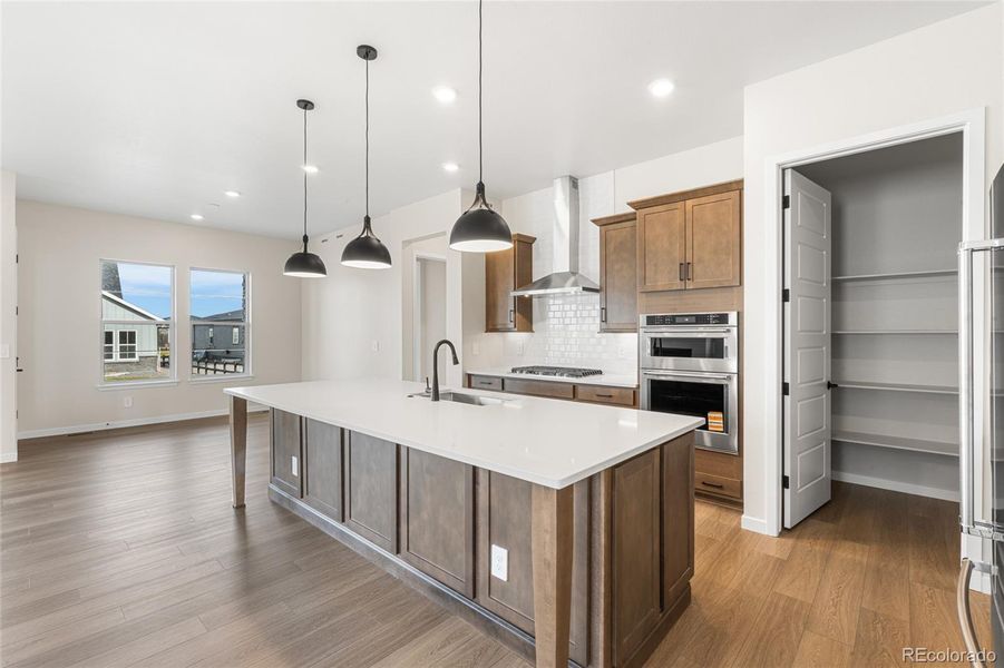 Furnished interior view inside a new home in Hilltop at Inspiration, Aurora (Image 9).