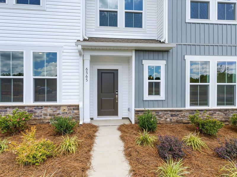 Exterior details and patio area of a home in Westwood Reserve, Charlotte (Image 21). Exterior details and patio area of a home in Westwood Reserve, Charlotte (Image 21).