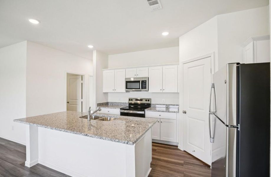 Furnished interior view inside a new home in Castlewood South, Taylor (Image 3).