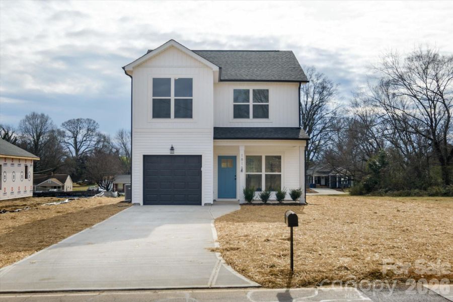 Front exterior of a new home in , Statesville, NC, highlighting curb appeal (Image 1). Front exterior of a new home in , Statesville, NC, highlighting curb appeal (Image 1).
