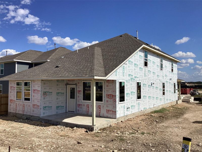 Exterior details and patio area of a home in The Homestead at Lariat, Liberty Hill (Image 3).