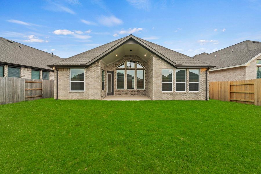 Exterior details and patio area of a home in Elyson 60's, Katy (Image 4).