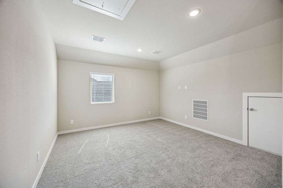 Game Room in the Willow home plan by Trophy Signature Homes – REPRESENTATIVE PHOTO