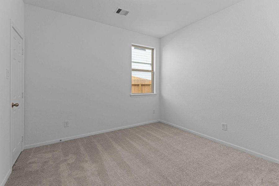 Your secondary bedroom features plush carpet, fresh paint, closet, and a large window that lets in plenty of natural lighting. Your secondary bedroom features plush carpet, fresh paint, closet, and a large window that lets in plenty of natural lighting.