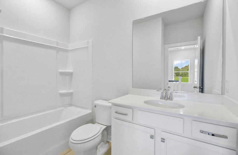 Furnished interior view inside a new home in Indigo Grove Townhomes, Johns Island (Image 12).