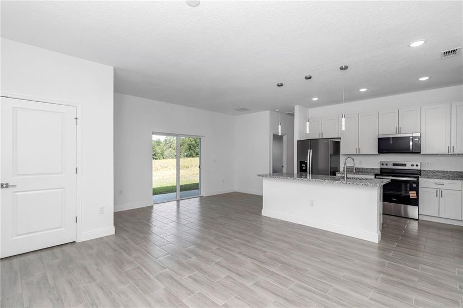 Furnished interior view inside a new home in , Citrus Springs (Image 6).