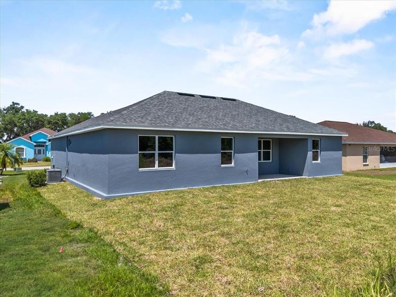 Front exterior of a new home in , Mulberry, FL, highlighting curb appeal (Image 19).
