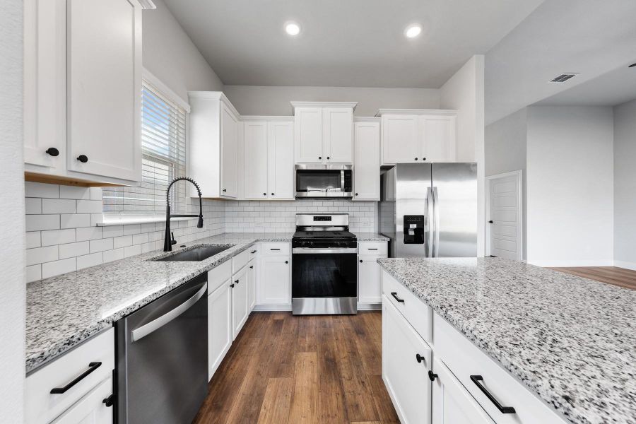 Furnished interior view inside a new home in TRACE, San Marcos (Image 5).