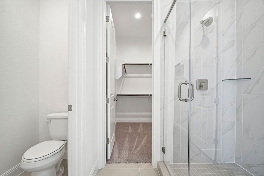 Furnished interior view inside a new home in 6 Creeks, Kyle (Image 9).