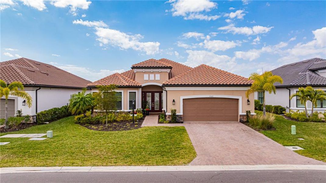 Front exterior of a new home in , Fort Myers, FL, highlighting curb appeal (Image 2).