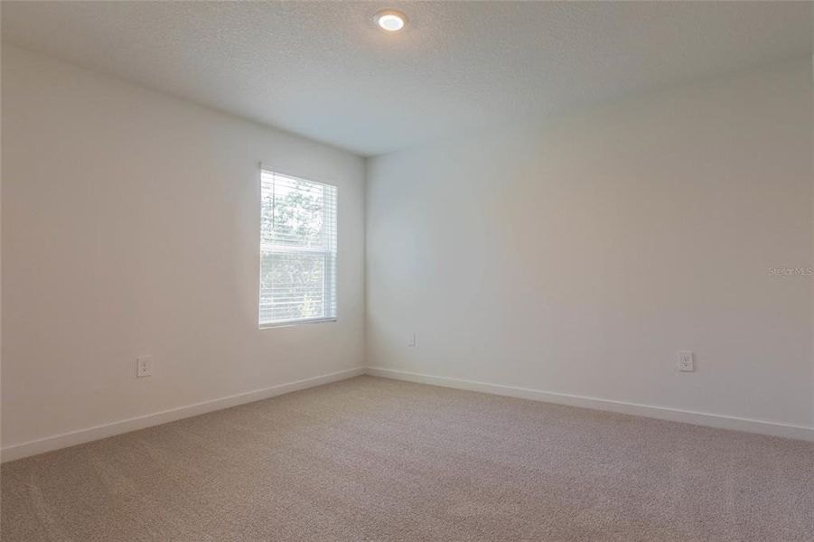 Spacious, unfurnished interior of a new home in Flagler Village - Classic Series, Palm Coast (Image 22).