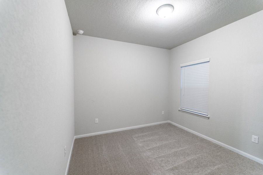 Spacious, unfurnished interior of a new home in Hennersby Hollow, San Antonio (Image 14).