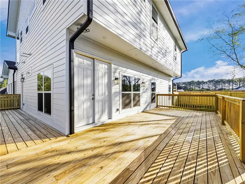 Exterior details and patio area of a home in , Loganville (Image 29).