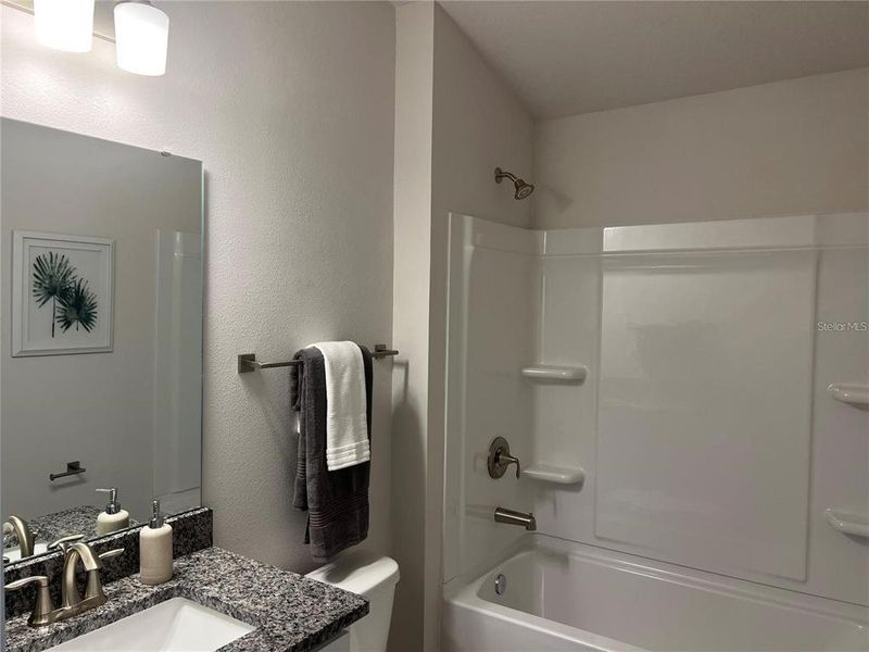 Furnished interior view inside a new home in Abbey Glen, Dade City (Image 15).