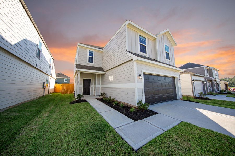 Front exterior of a new home in Wayside Village, Houston, TX, highlighting curb appeal (Image 2). Front exterior of a new home in Wayside Village, Houston, TX, highlighting curb appeal (Image 2).
