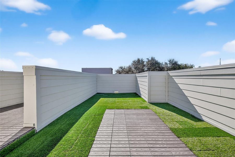 Rooftop views with a little turf under your toes -- your private slice of "staycation" paradise!