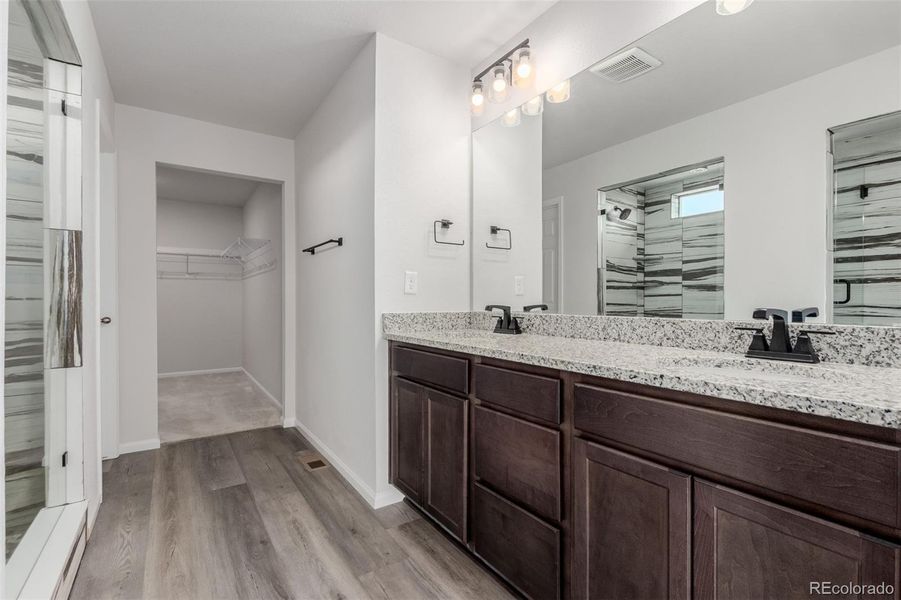 Furnished interior view inside a new home in The Aurora Highlands, Aurora (Image 7).