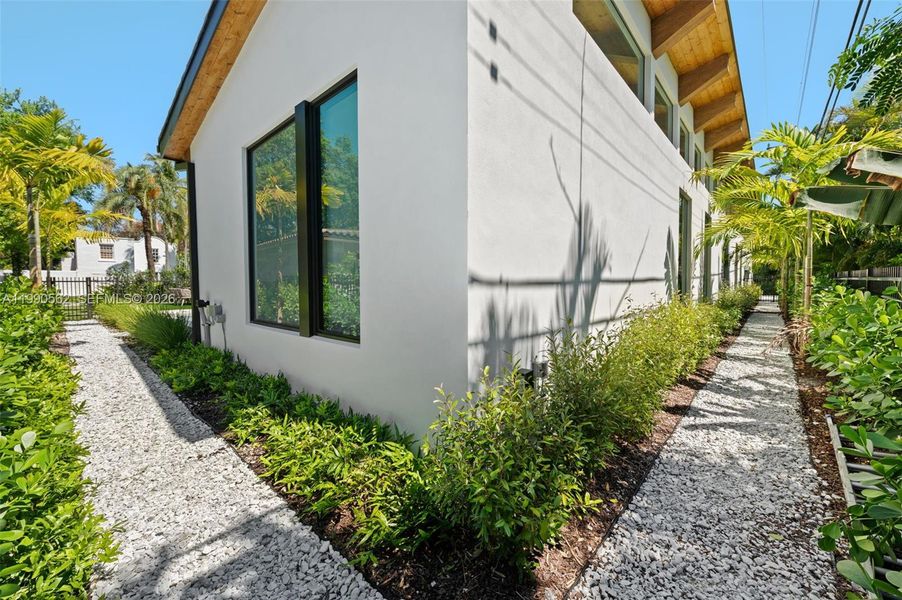 Exterior details and patio area of a home in , Coral Gables (Image 28).