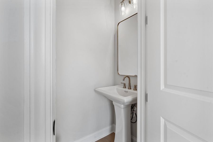 Representative furnished interior of a home built from the 
                        
                         by The Providence Group in Ward's Crossing Townhomes, Johns Creek (Image 10).