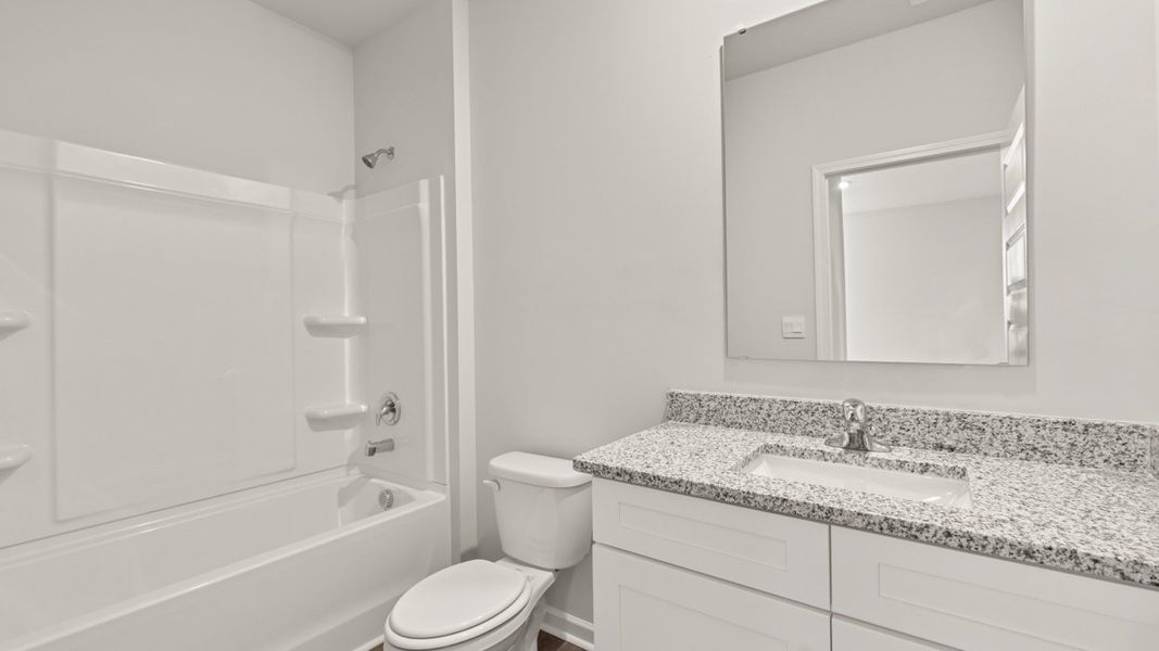 Representative furnished interior of a home built from the Mansfield by D.R. Horton in Southwind Village, Evans (Image 12).