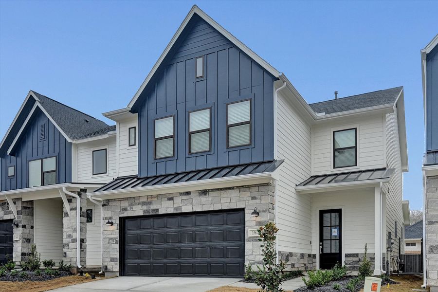 Front exterior of a new home in Summer Place  35', Montgomery, TX, highlighting curb appeal (Image 29).