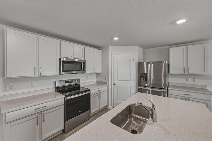 Furnished interior view inside a new home in Berry Bay, Wimauma (Image 11).