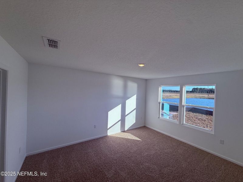 Spacious, unfurnished interior of a new home in The Arbors, Jacksonville (Image 24).