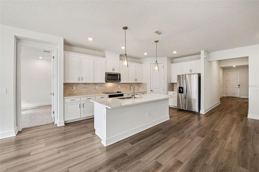 Furnished interior view inside a new home in Legends Preserve - Signature Series, Daytona Beach (Image 3).