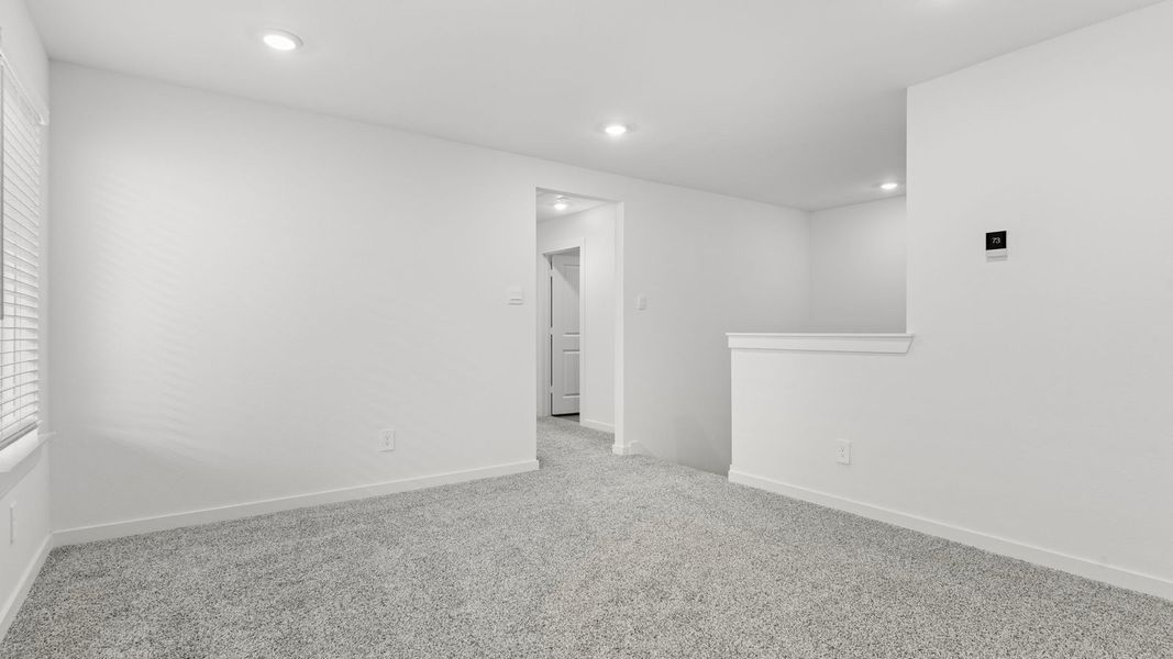Spacious, unfurnished interior of a new home in Villarosa at Tamarron, Katy (Image 42).