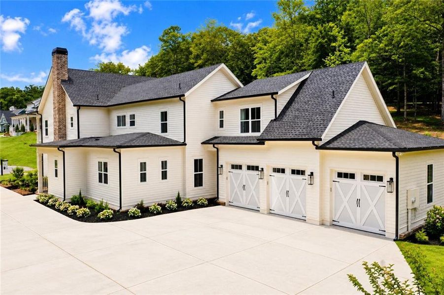 Front exterior of a new home in , Dacula, GA, highlighting curb appeal (Image 29). Front exterior of a new home in , Dacula, GA, highlighting curb appeal (Image 29).