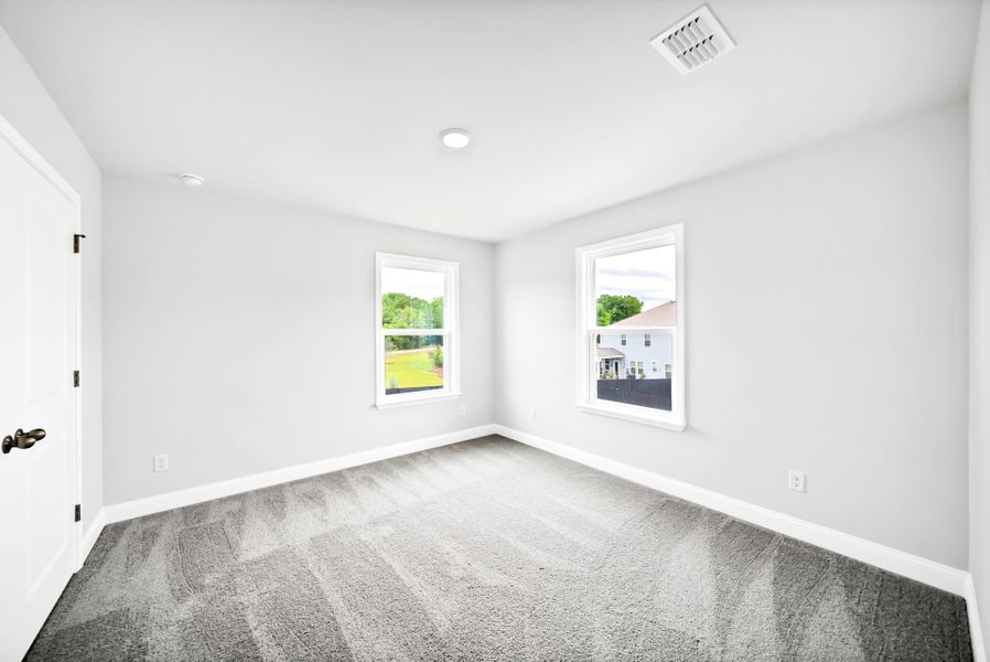 Spacious, unfurnished interior of a new home in Monroe Preserve, Chapin (Image 17).