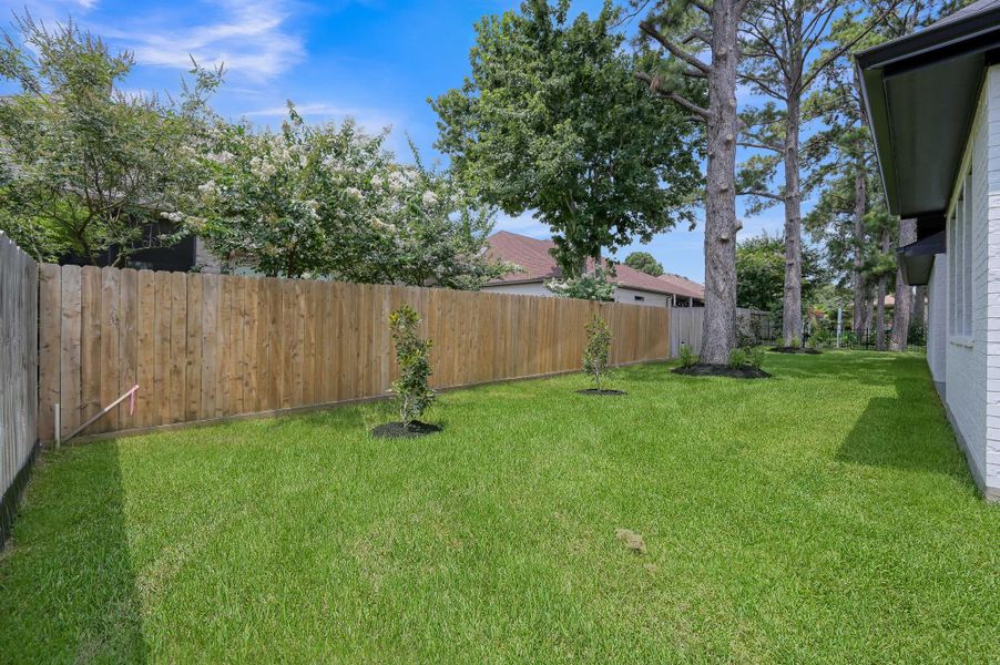 The backyard provides ideal space for play, pets, or a future pool addition. The backyard provides ideal space for play, pets, or a future pool addition.