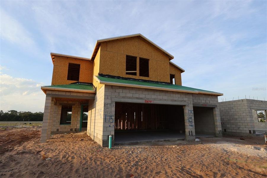 In-progress construction of a new home in Center Lake on the Park, St. Cloud, FL (Image 7).