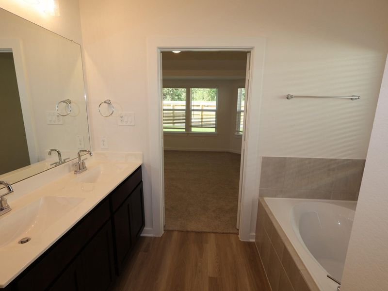 Furnished interior view inside a new home in Pinewood at Grand Texas, New Caney (Image 5).