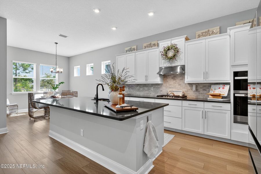 Furnished interior view inside a new home in RiverTown - WaterSong, St. Johns (Image 12).