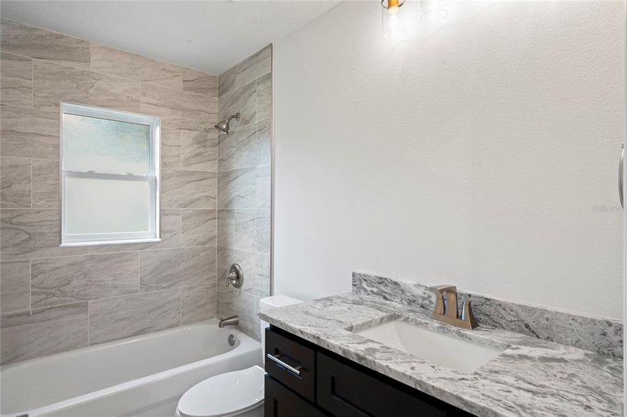 Bathroom2 Tub/Shower combo - granite counter