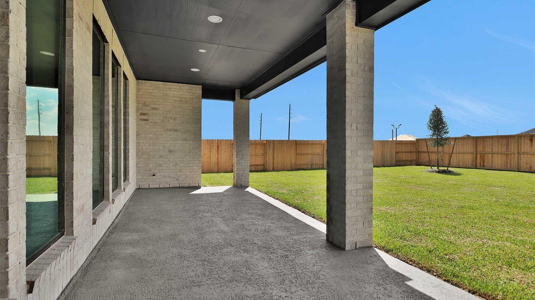 Exterior details and patio area of a home in Legacy Prairie at Katy Court, Katy (Image 2).