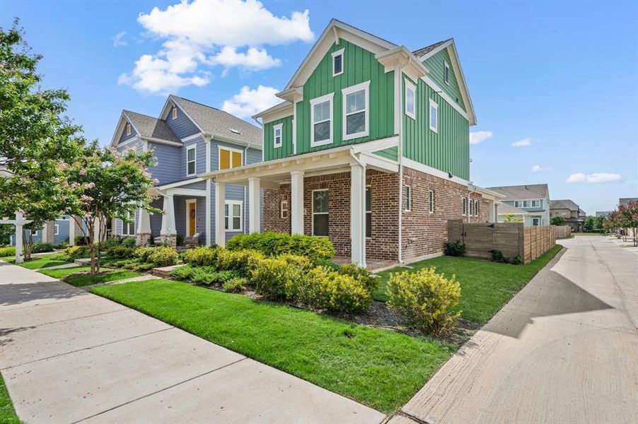 Front exterior of a new home in HomeTown Garden, North Richland Hills, TX, highlighting curb appeal (Image 23). Front exterior of a new home in HomeTown Garden, North Richland Hills, TX, highlighting curb appeal (Image 23).