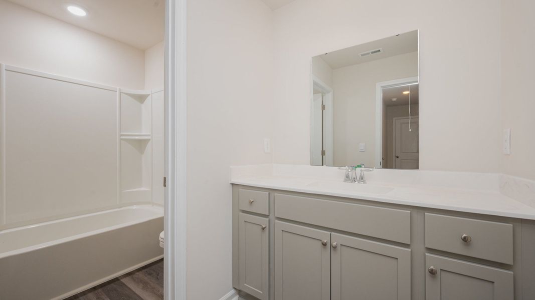 Furnished interior view inside a new home in Indigo Preserve, Leland (Image 9).