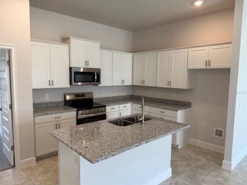 Picture from similar home with same floor plan. Materials and colors may vary.