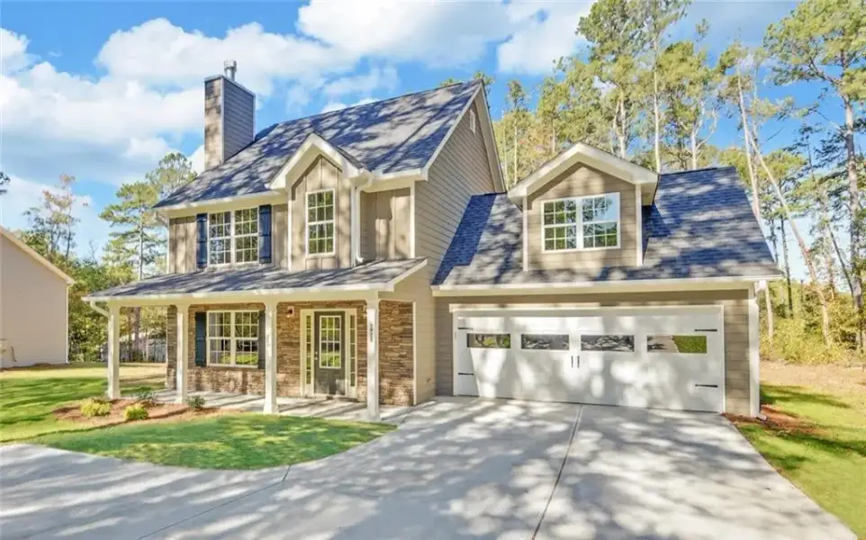 Front exterior of a new home in , Gainesville, GA, highlighting curb appeal (Image 1). Front exterior of a new home in , Gainesville, GA, highlighting curb appeal (Image 1).