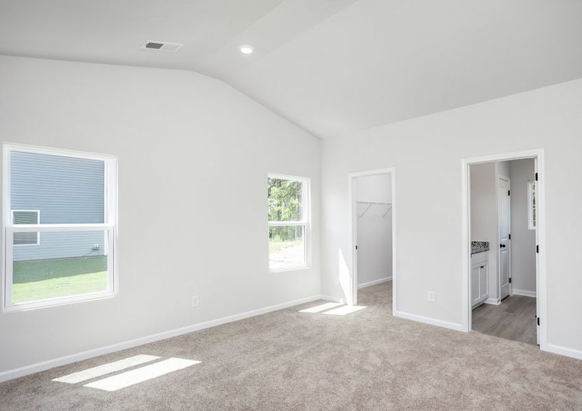 the master bedroom has big windows