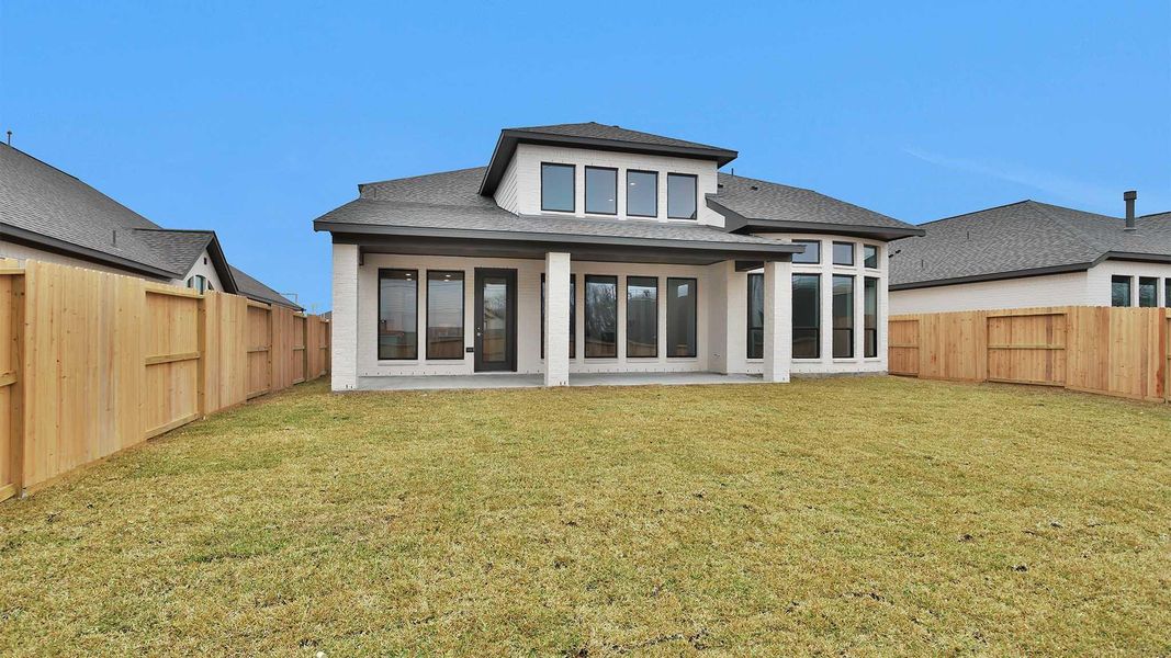 Exterior details and patio area of a home in Sienna, Missouri City (Image 4). Exterior details and patio area of a home in Sienna, Missouri City (Image 4).