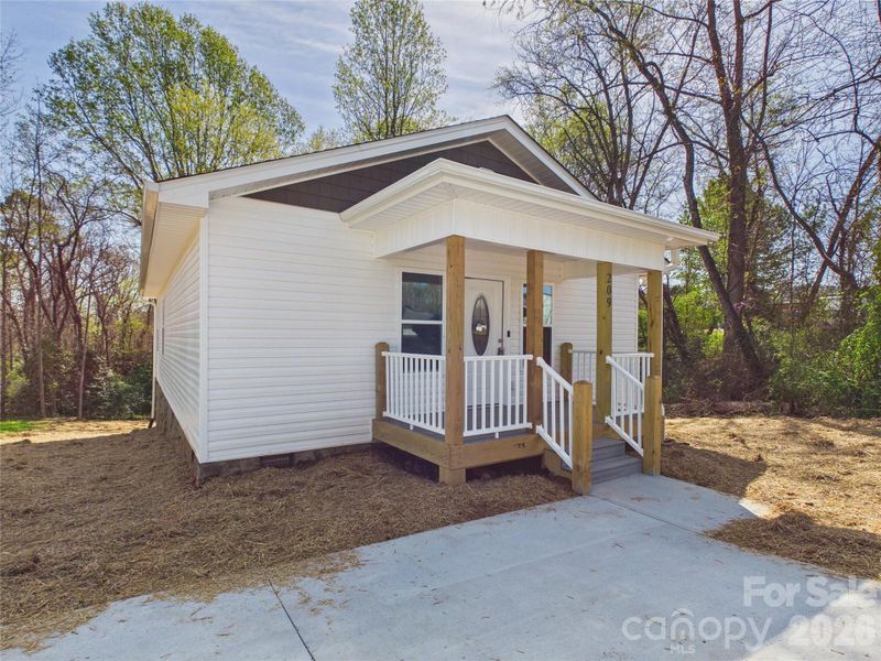 Exterior details and patio area of a home in , Valdese (Image 19).