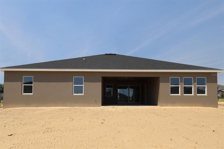 Exterior details and patio area of a home in Wolf Lake Ranch, Apopka (Image 5).