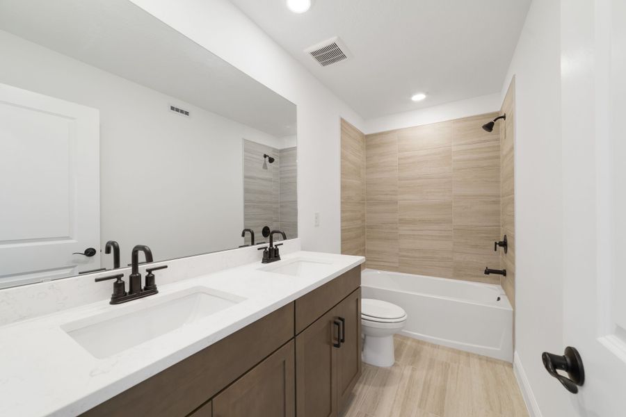Furnished interior view inside a new home in Vintner Reserve, Clermont (Image 13).