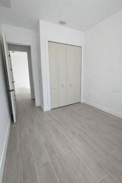 Spacious, unfurnished interior of a new home in , Port Charlotte (Image 12).