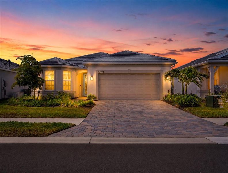 Front exterior of a new home in , Englewood, FL, highlighting curb appeal (Image 2). Front exterior of a new home in , Englewood, FL, highlighting curb appeal (Image 2).