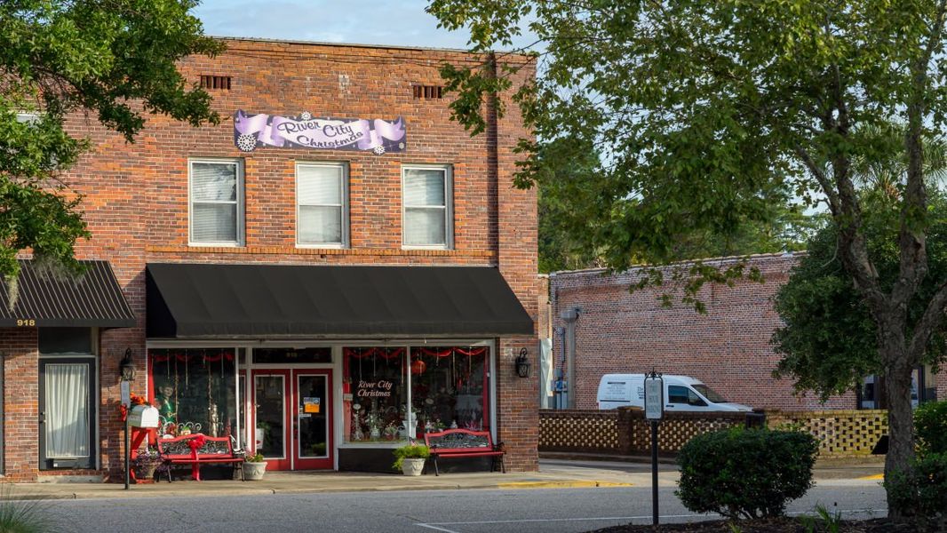 Front exterior of a new home in Dove Crossing, Conway, SC, highlighting curb appeal (Image 2).